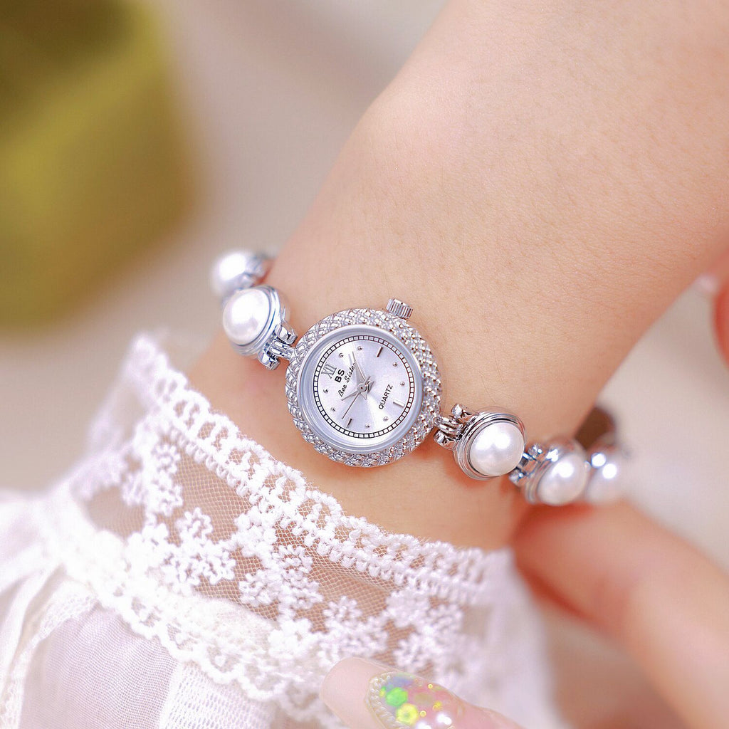 A light luxury pearl bracelet watch for elegant women