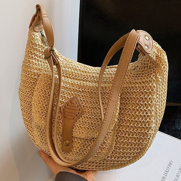 A casual and vacation-style straw-woven bag for women