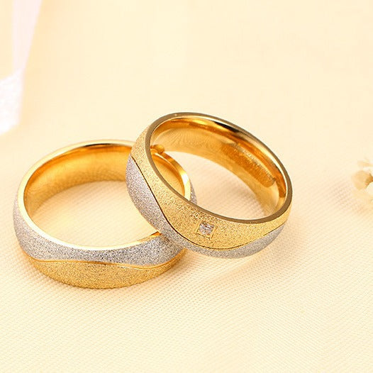 Fashionable titanium steel couple rings with gold inlaid zircon