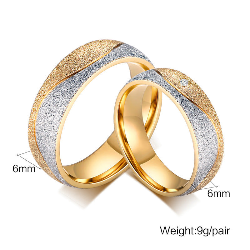 Fashionable titanium steel couple rings with gold inlaid zircon